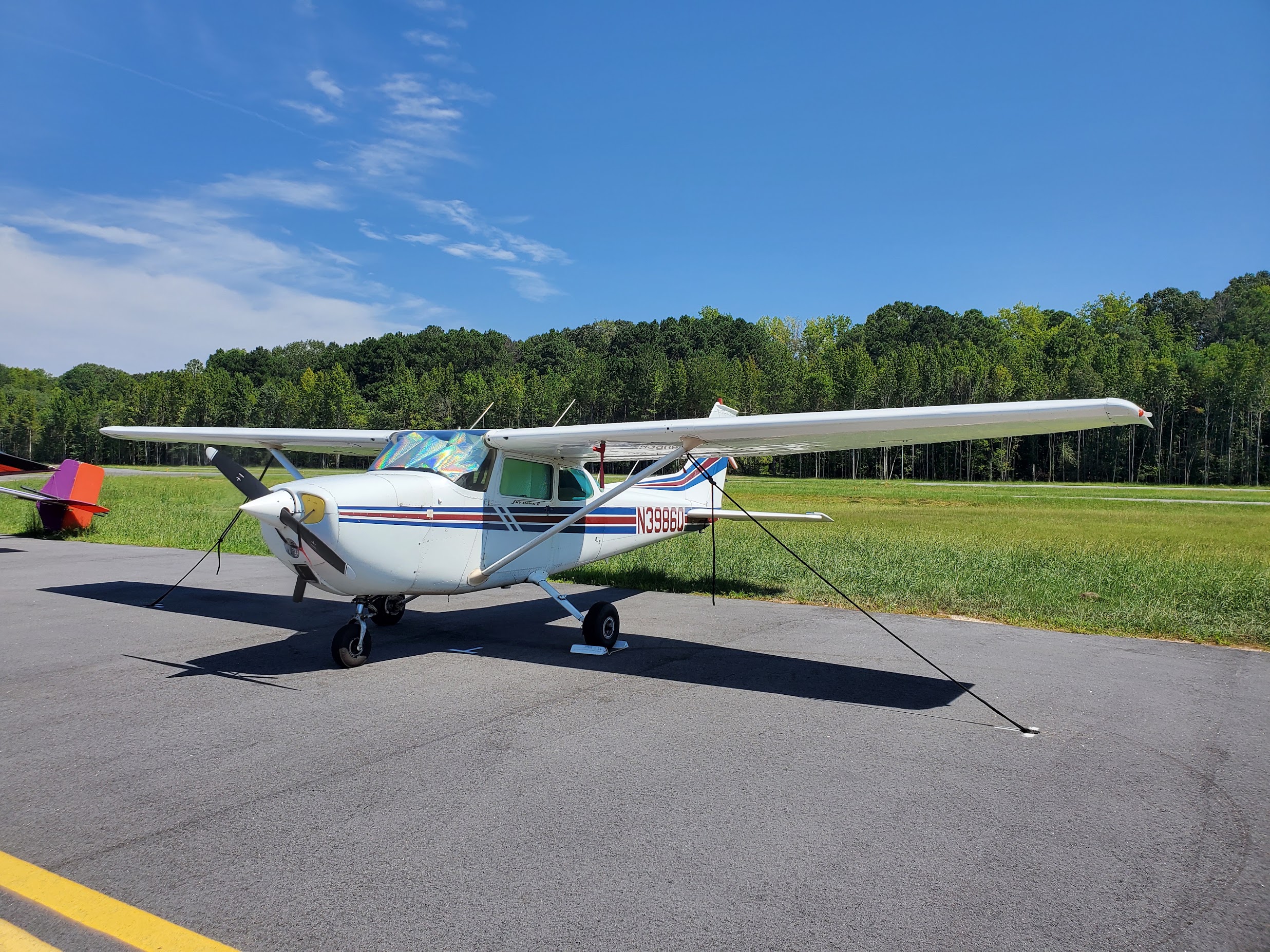 N3986Q parked on a grass runway in North Carolina